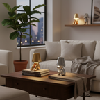 Cozy living room with a coffee table, couch, and decorative items.